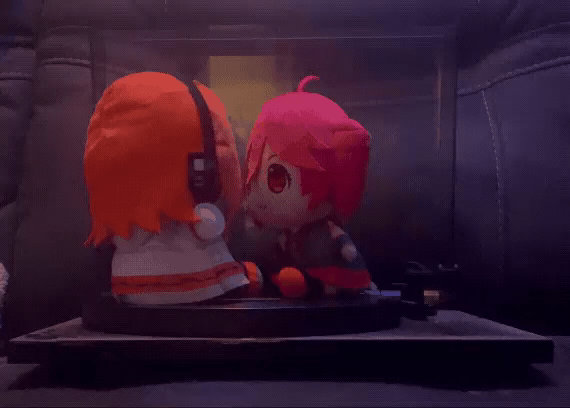 A GIF of a big Teto plushie and a Rei fumo plushie spinning on a record player looking at each other.

Video by @itz_xen0n on Twitter.